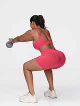 red sports bra and shorts set