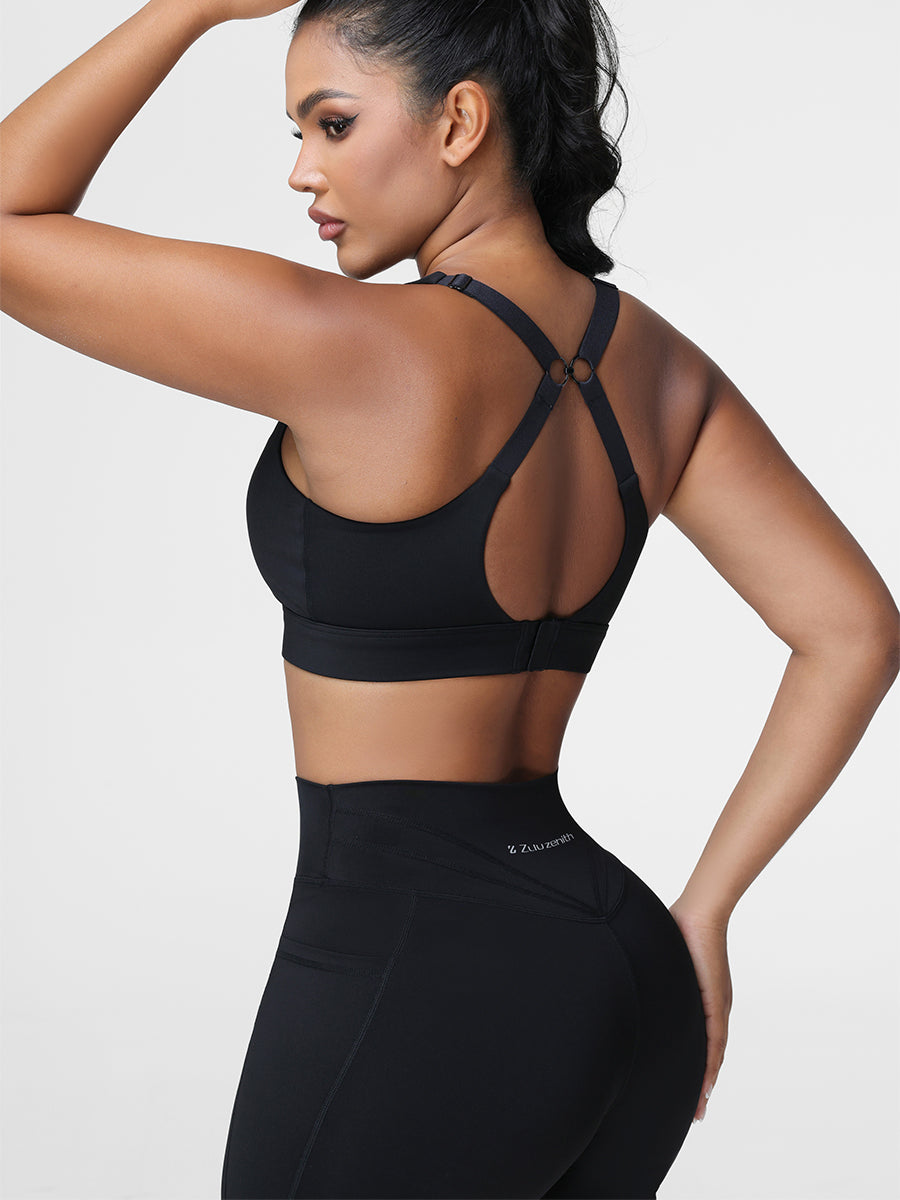 Adjustable strap sports bra in Black - back view showing the cut-out racerback strap design.
