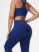Running set in Navy Blue - close-up of the pocket leggings showing the butt lifting seat seam.