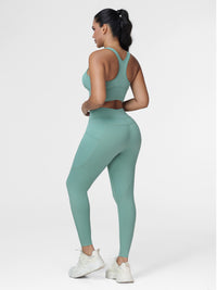 Running set for women in Green - back view showing the racerback sports bra and the wide waistband.