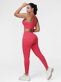 Running set for women in Cranberry Red - side view showing the racerback bra and the slim leggings.