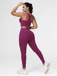 Running set for women in Deep Purple - side view showing the racerback bra and the slim leggings.