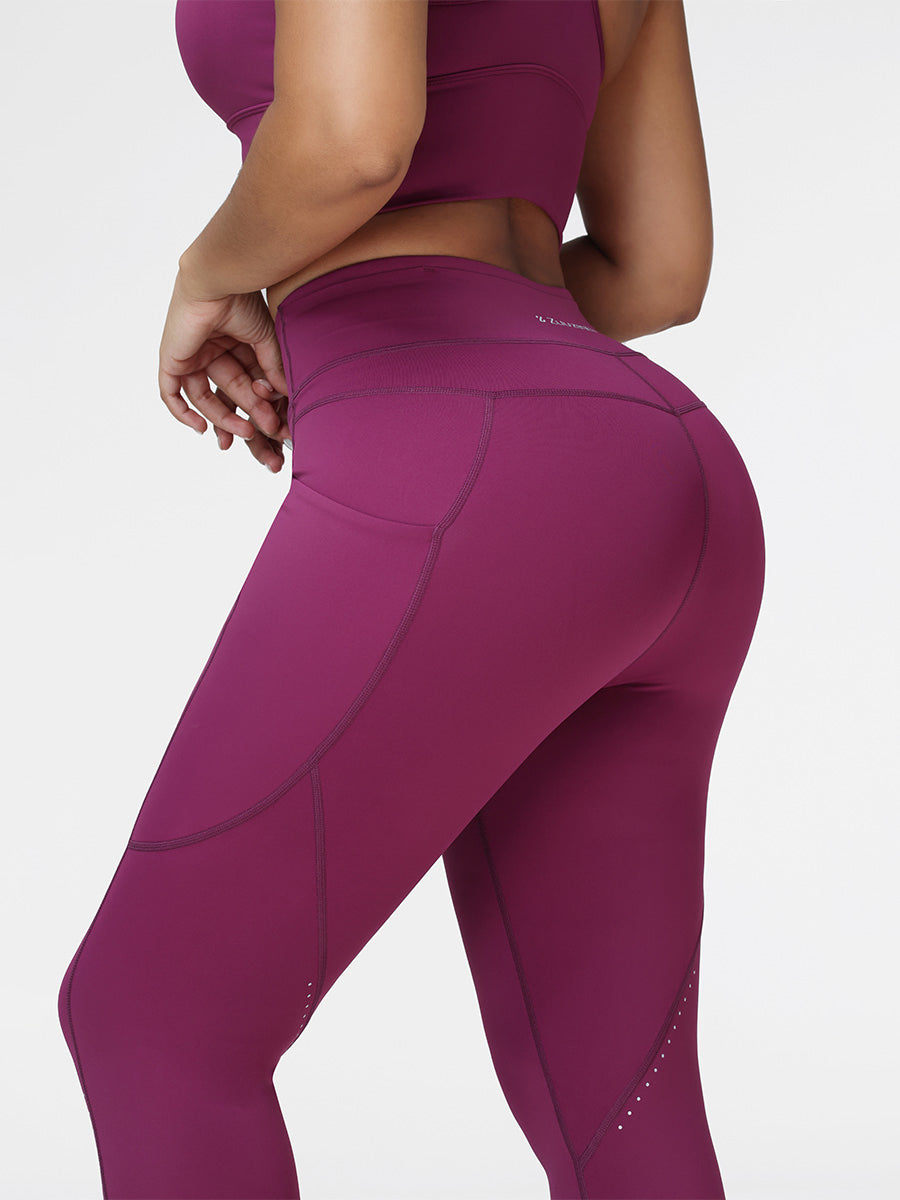 Running set in Deep Purple - close-up of the pocket leggings showing the contoured seat seam.