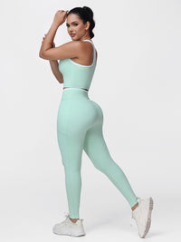 Women's 2 Piece Workout Set Racerback Sports Bra and Cross Waist Pocket Leggings
