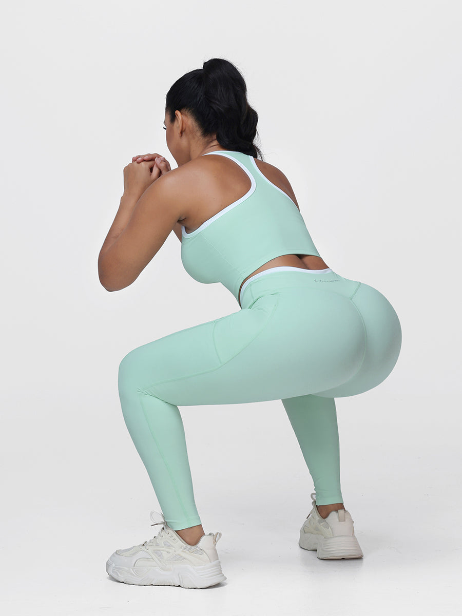 Women's 2 Piece Workout Set Racerback Sports Bra and Cross Waist Pocket Leggings