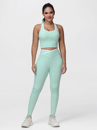 Women's 2 Piece Workout Set Racerback Sports Bra and Cross Waist Pocket Leggings