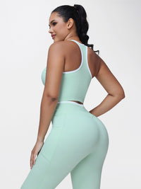 Women's 2 Piece Workout Set Racerback Sports Bra and Cross Waist Pocket Leggings